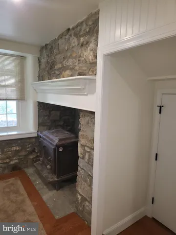a living room with a fireplace