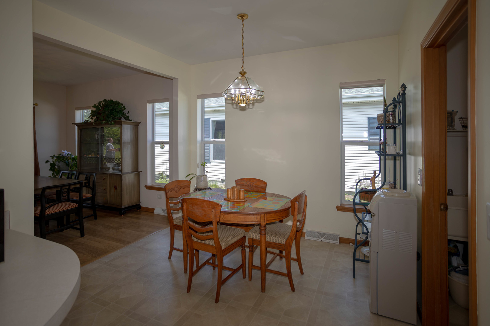 212 Rodeo Drive, Unit 2179 Grayslake, IL 60030 - Photo 13 of 31 a dining room with furniture window and wooden floor