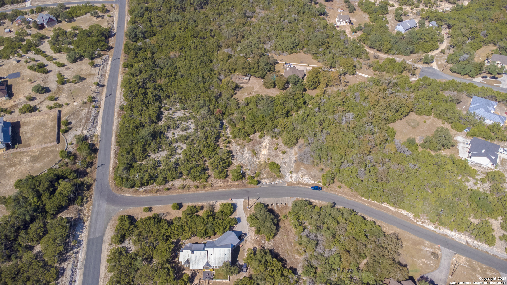 0 Tbd- Stallion Estates Spring Branch, TX 78070 - Photo 2 of 9 a view of a balcony with wooden floor and lake view