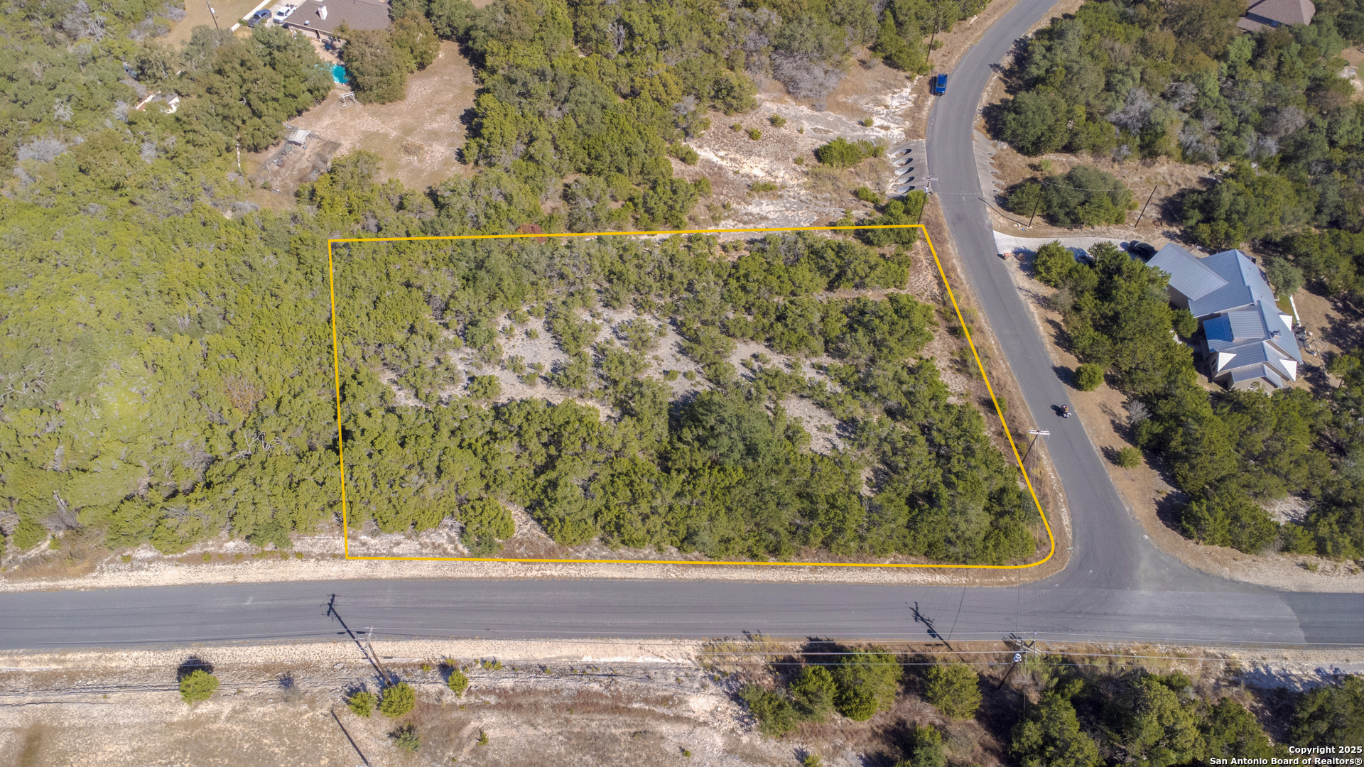 0 Tbd- Stallion Estates Spring Branch, TX 78070 - Photo 5 of 9 a view of a yard with plants and wooden fence