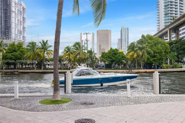 a view of swimming pool with chairs