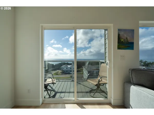 a view of a living room and a window