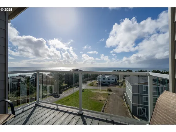 a view of swimming pool with furniture