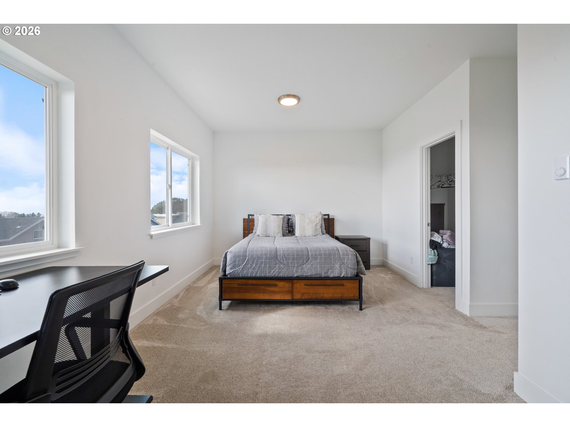 120 Reeder Street Tillamook, OR 97141 - Photo 27 of 41 a bedroom with bed and a window