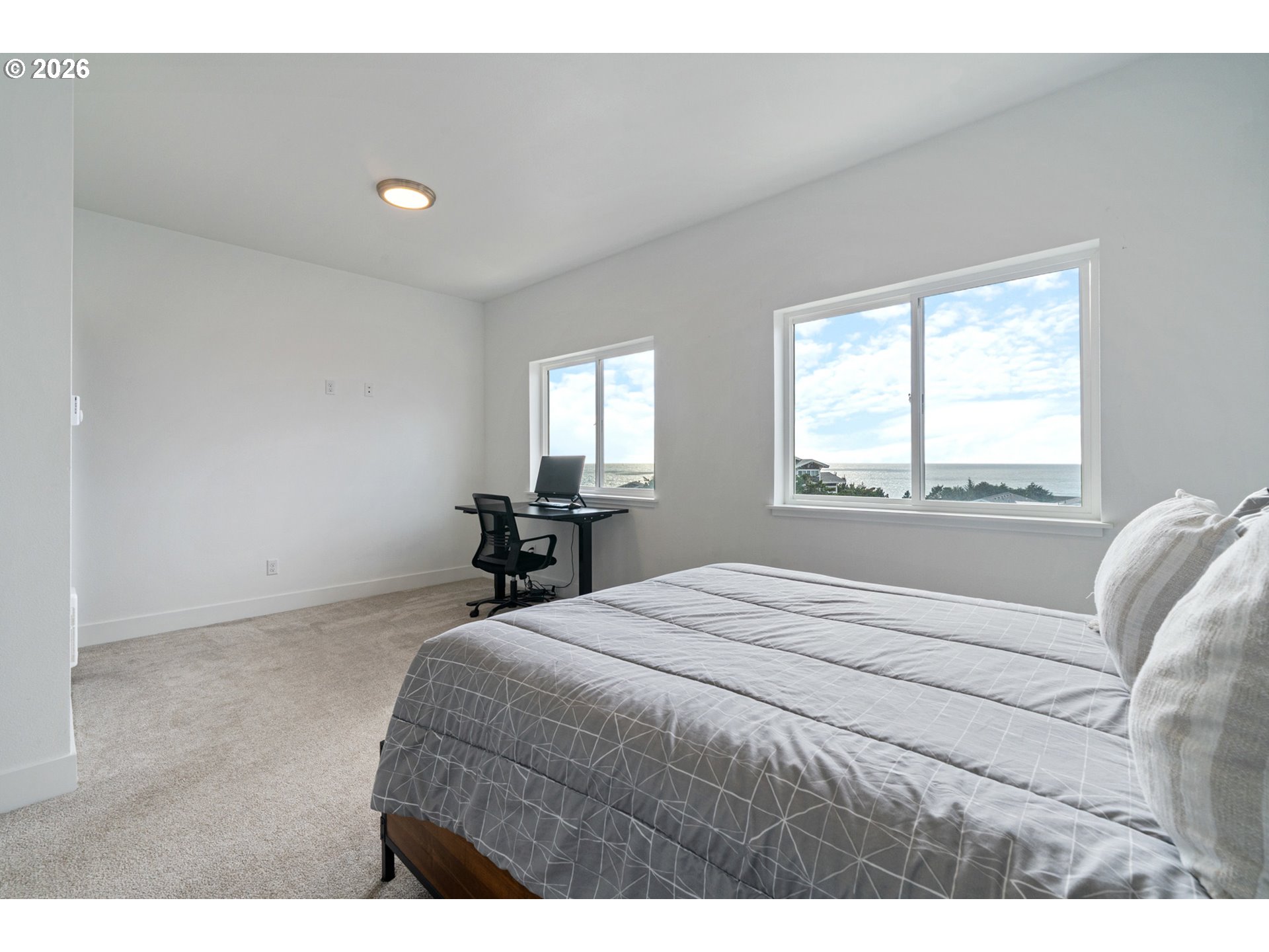 120 Reeder Street Tillamook, OR 97141 - Photo 29 of 41 a bedroom with a bed and a window
