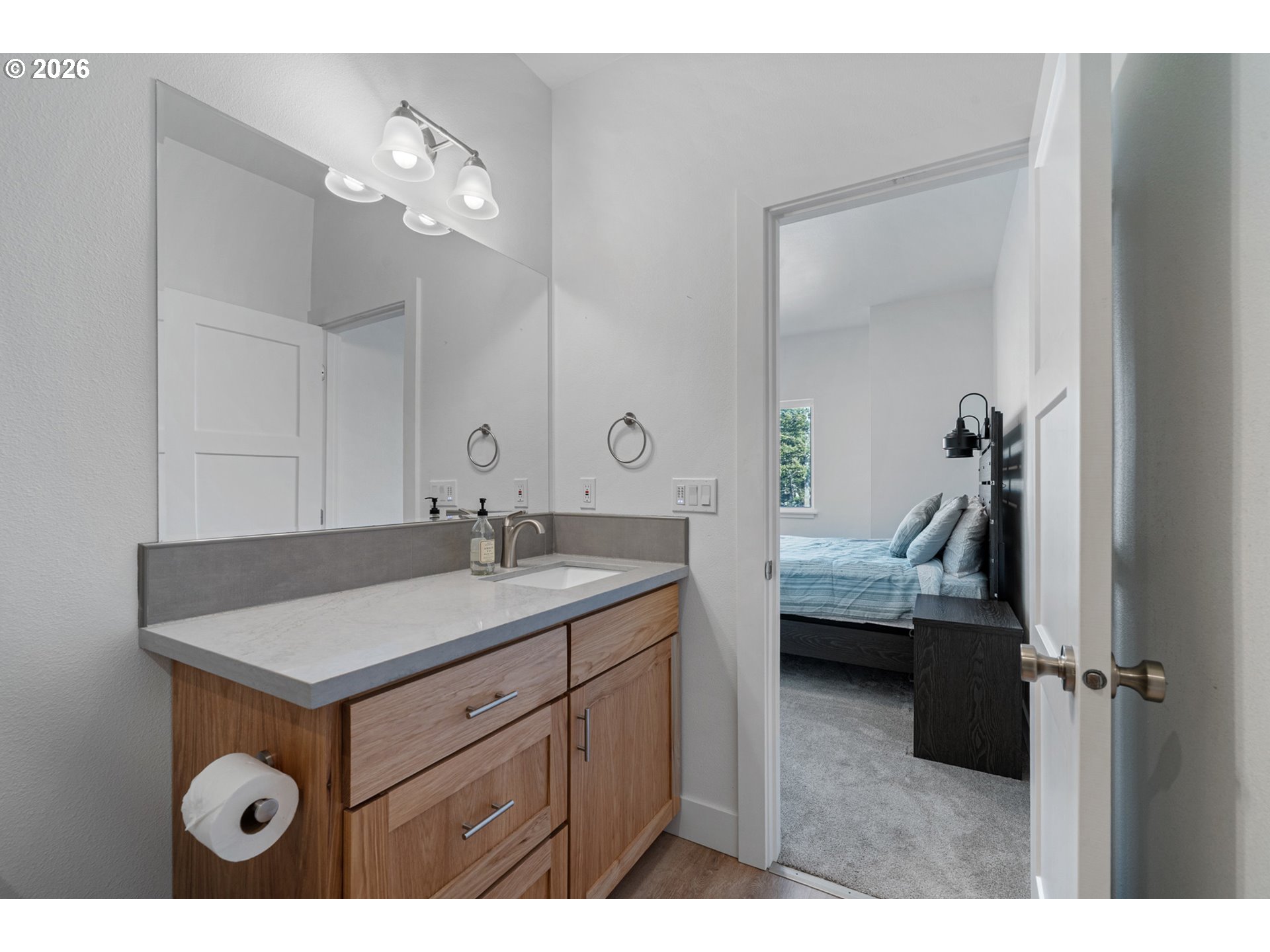 120 Reeder Street Tillamook, OR 97141 - Photo 34 of 41 a en suite bathroom with a sink and mirror