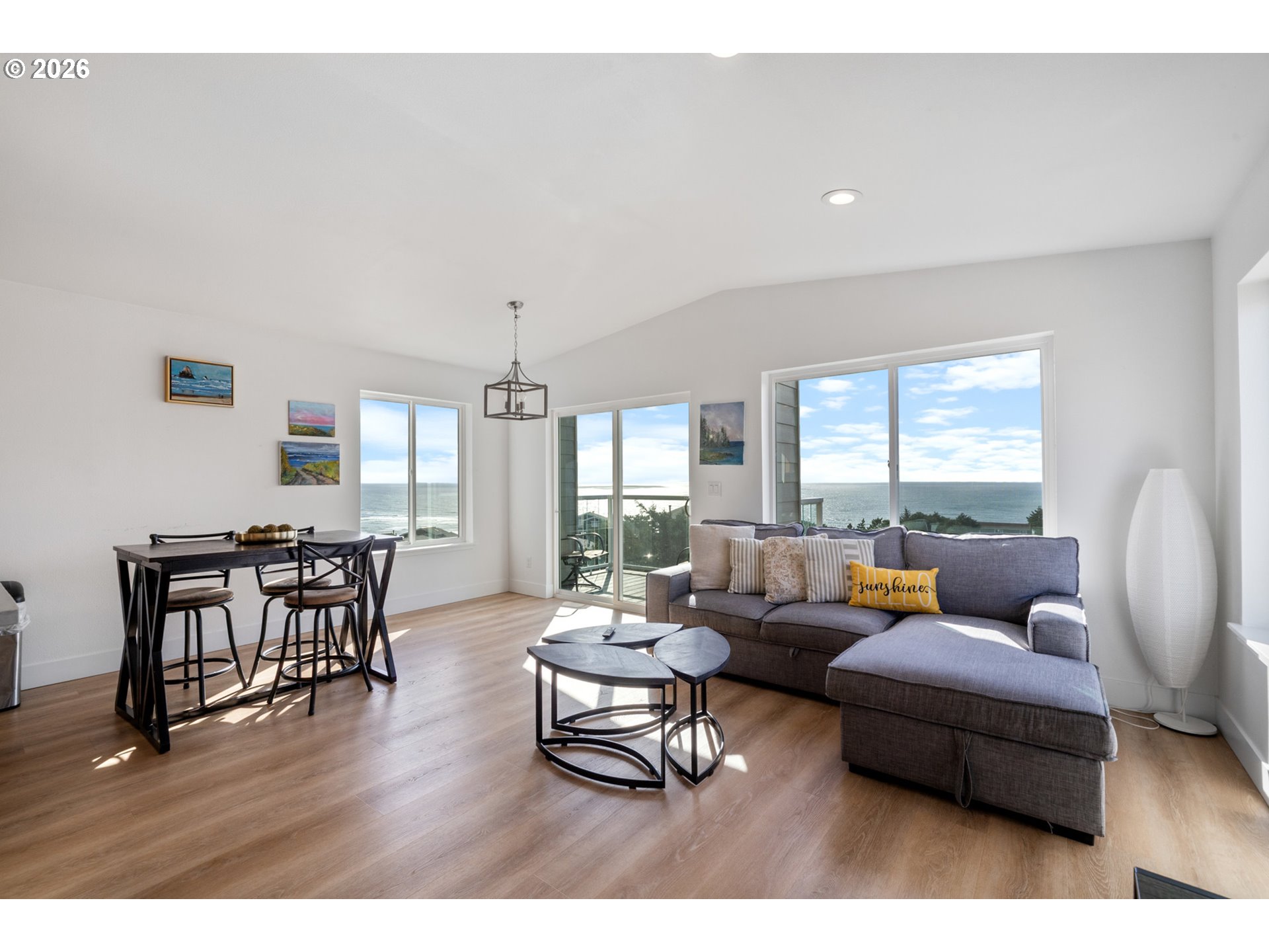 120 Reeder Street Tillamook, OR 97141 - Photo 6 of 41 a living room with furniture wooden floor and a window