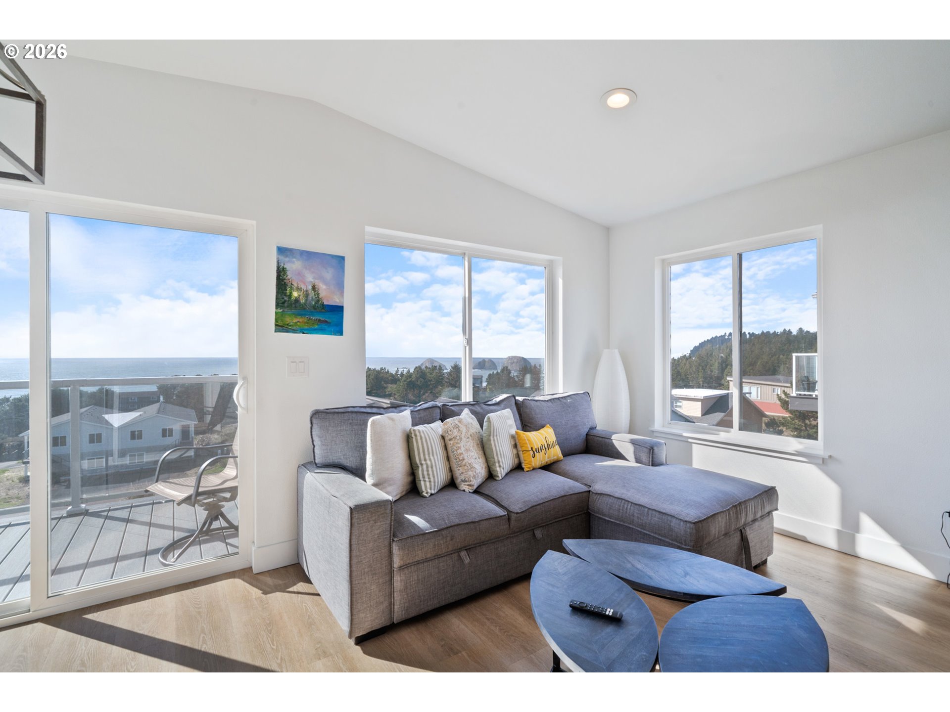 120 Reeder Street Tillamook, OR 97141 - Photo 8 of 41 a living room with furniture and a large window