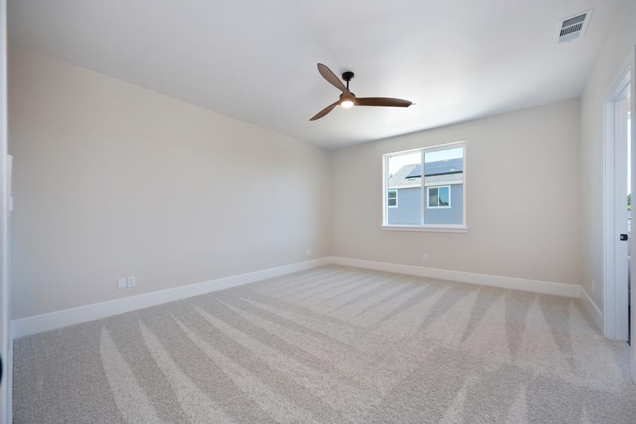 3301 Stone Field Way Loomis, CA 95650 - Photo 18 of 33 a view of an empty room with a window