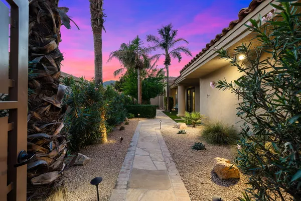 a house with trees in front of it
