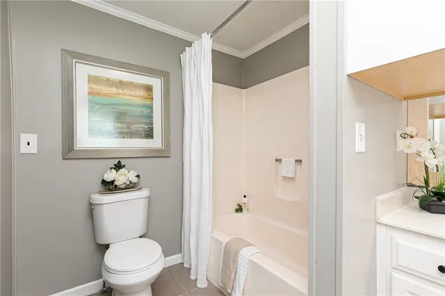 a bathroom with a double vanity sink a mirror and shower