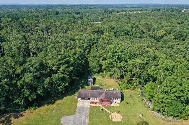 a view of a backyard of a house