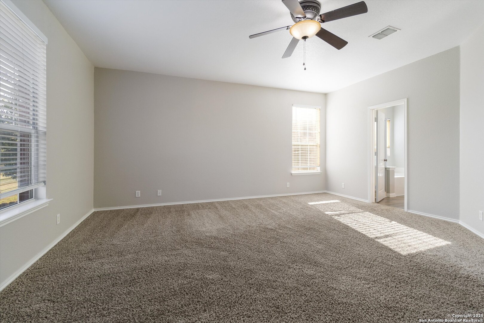 13506 Misty View San Antonio, TX 78245 - Photo 12 of 29 a view of an empty room with a window