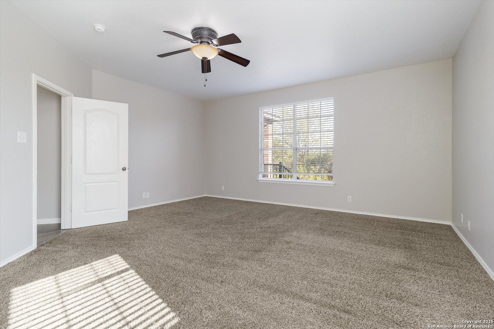 13506 Misty View San Antonio, TX 78245 - Photo 13 of 29 a view of an empty room with a window