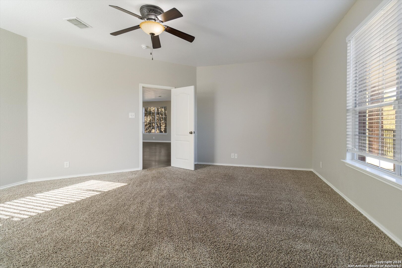 13506 Misty View San Antonio, TX 78245 - Photo 14 of 29 a view of an empty room with a window