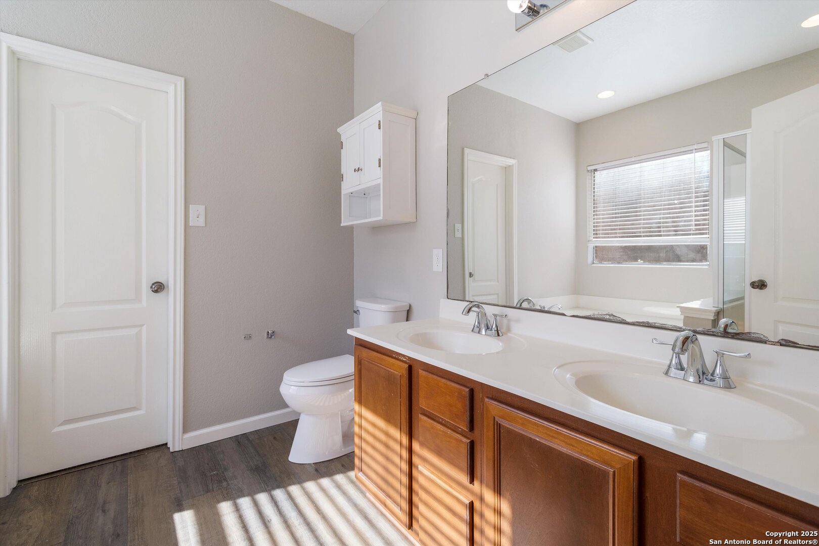 13506 Misty View San Antonio, TX 78245 - Photo 16 of 29 a bathroom with a sink and a mirror