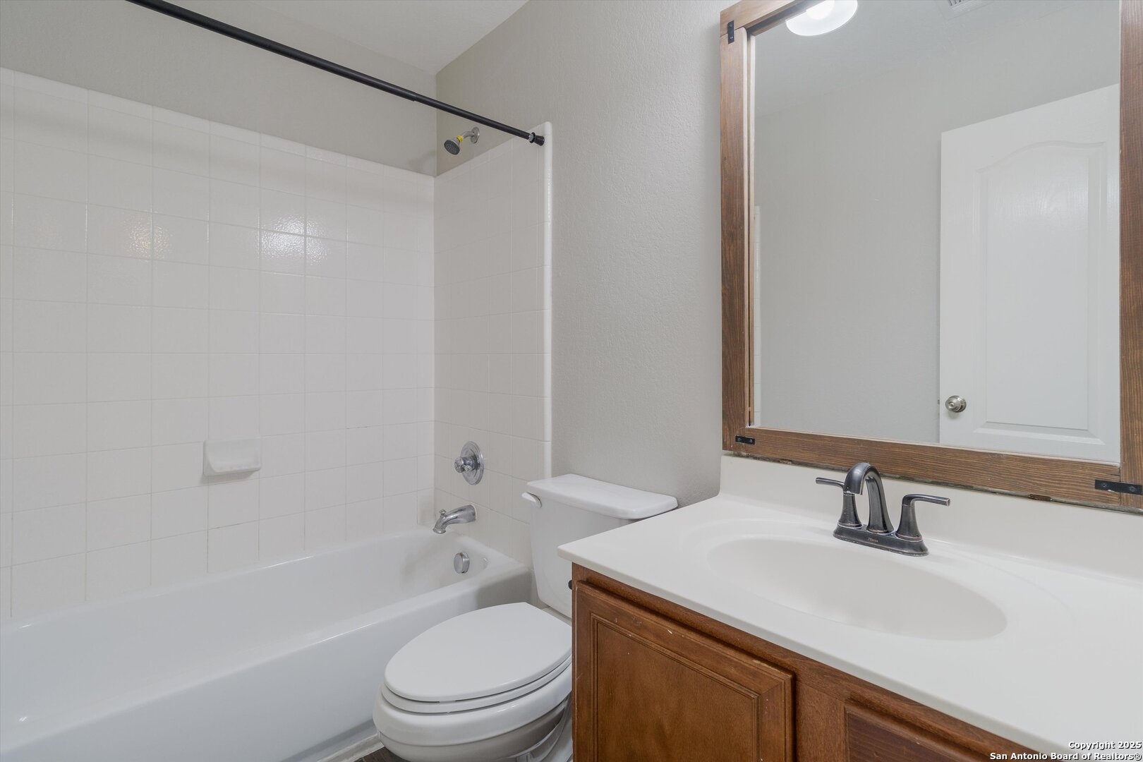 13506 Misty View San Antonio, TX 78245 - Photo 22 of 29 a bathroom with a sink a toilet and a bathtub