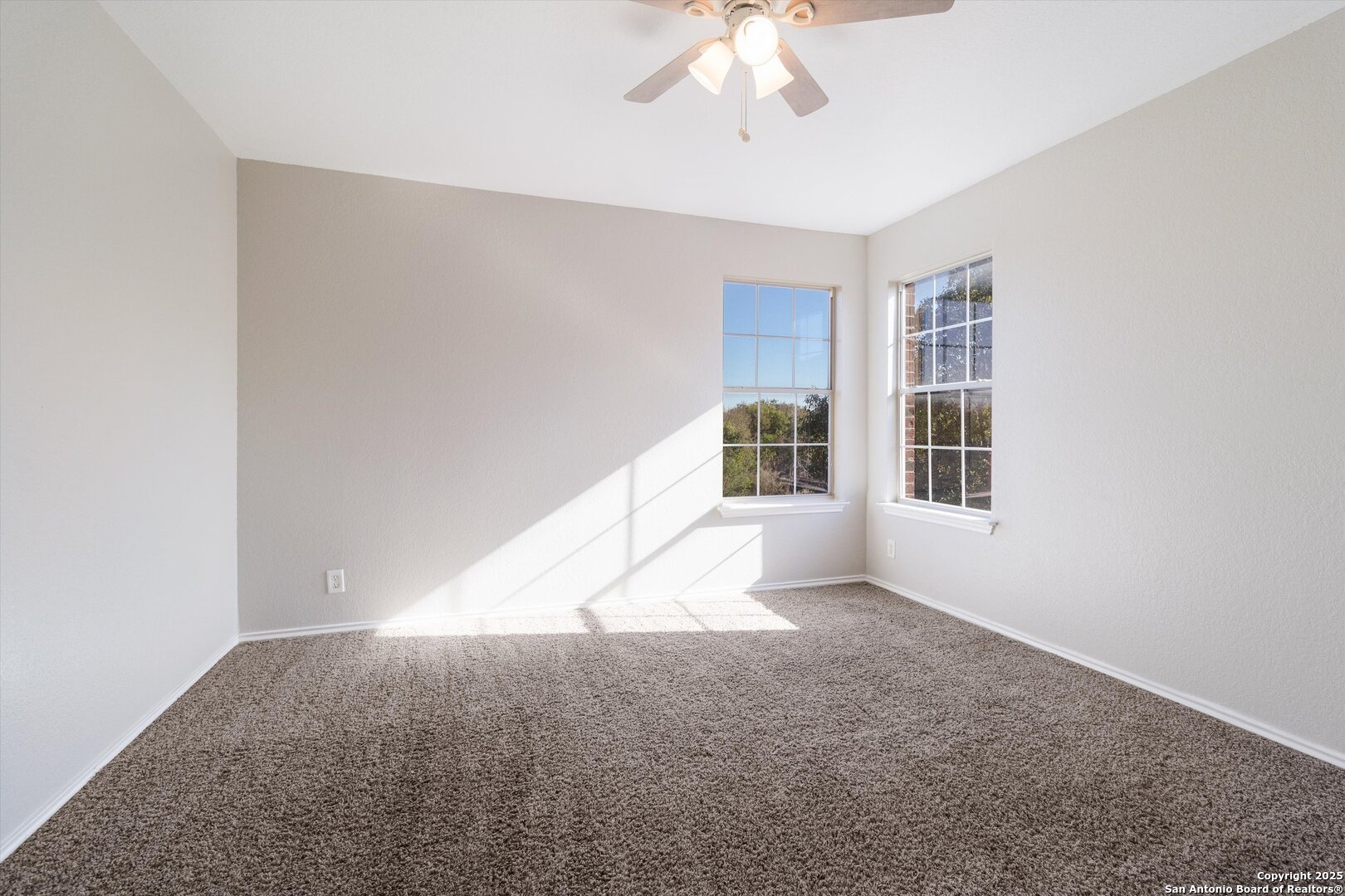 13506 Misty View San Antonio, TX 78245 - Photo 24 of 29 an empty room with windows