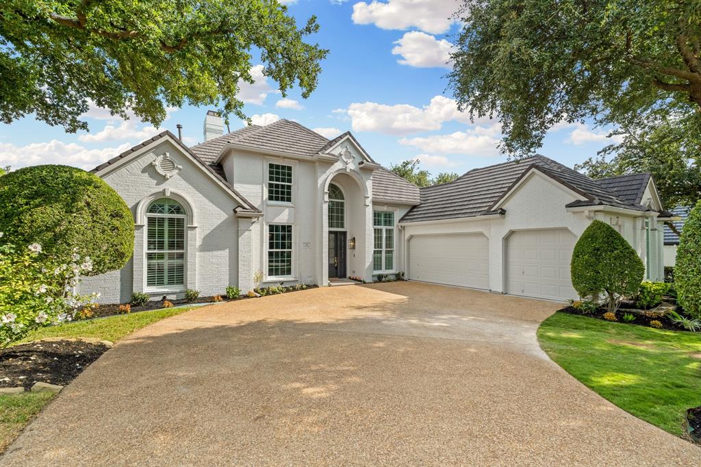 4 Shadow Ridge Court Frisco, TX 75034 - Photo 1 of 1 a front view of a house with a yard and garage