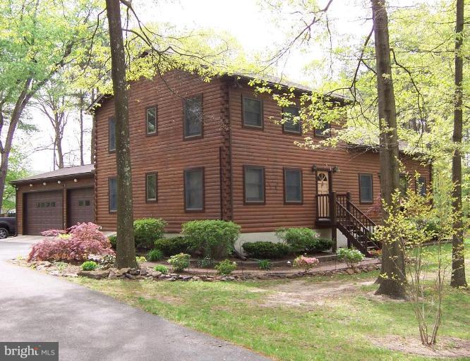 204 Burns Crossing Road Severn, MD 21144 - Photo 28 of 30 a front view of a house with garden