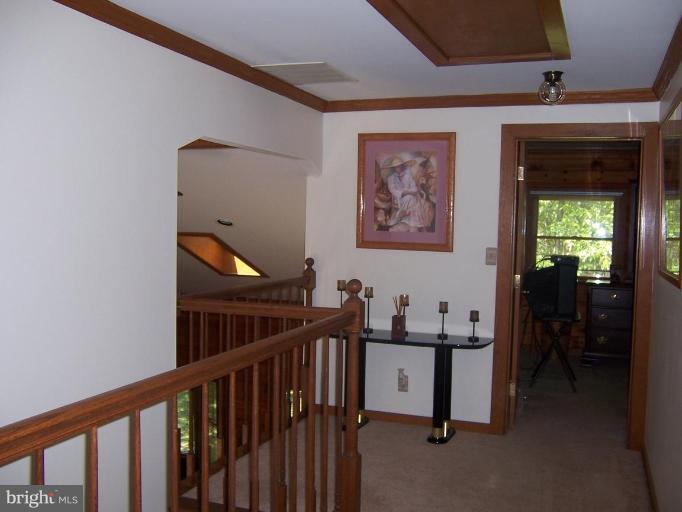 204 Burns Crossing Road Severn, MD 21144 - Photo 8 of 30 a view of a hallway with workspace