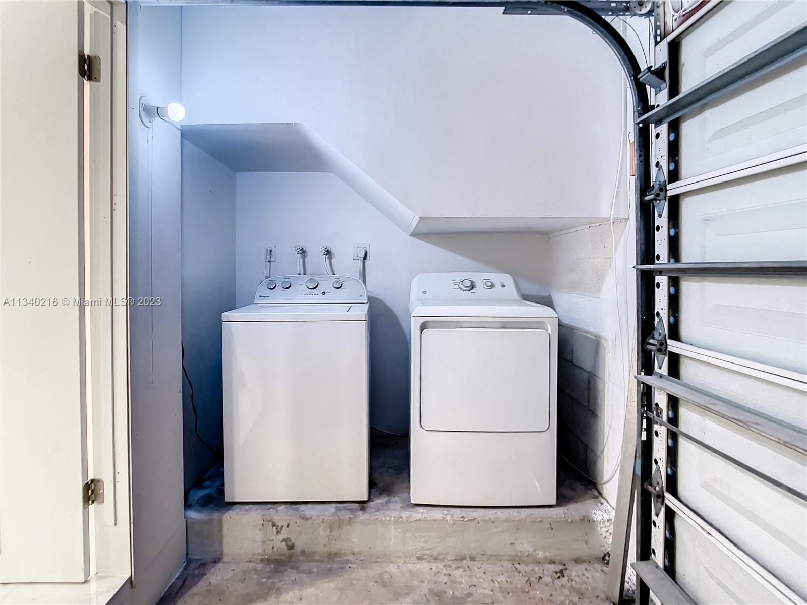 14031 Langley Place Davie, FL 33325 - Photo 25 of 27 a utility room with dryer and washer