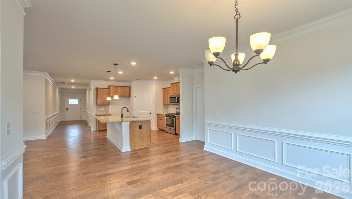 649 River Btm Road Fletcher, NC 28732 - Photo 9 of 40 a view of a dining area with a chandelier