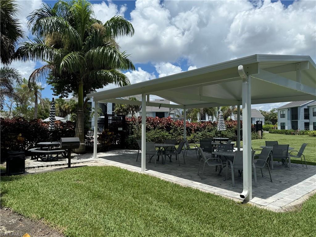 13631 Eagle Ridge Drive, Unit 226 Fort Myers, FL 33912 - Photo 18 of 19 a view of outdoor space yard and porch