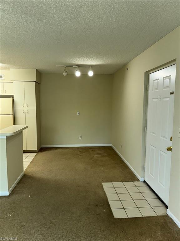 13631 Eagle Ridge Drive, Unit 226 Fort Myers, FL 33912 - Photo 5 of 19 an empty room with a empty space