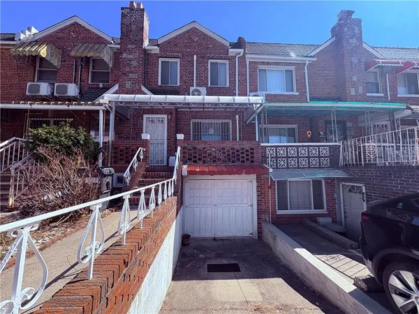 a front view of a house with balcony