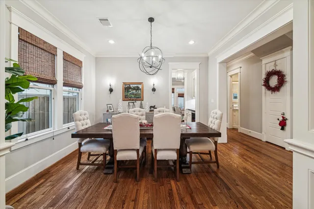 a view of dining table cabinets and bedroom