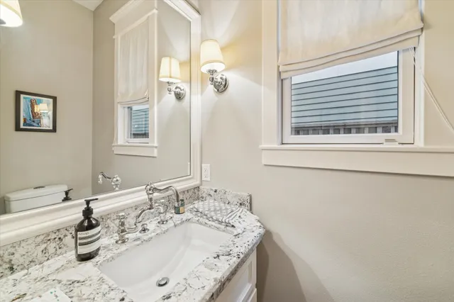 a view of a balcony with chairs