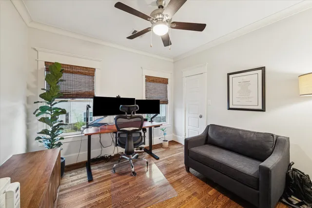 a bedroom with a bed and a table in it