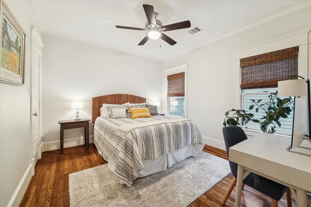 a bathroom with a granite countertop sink and a mirror a toilet