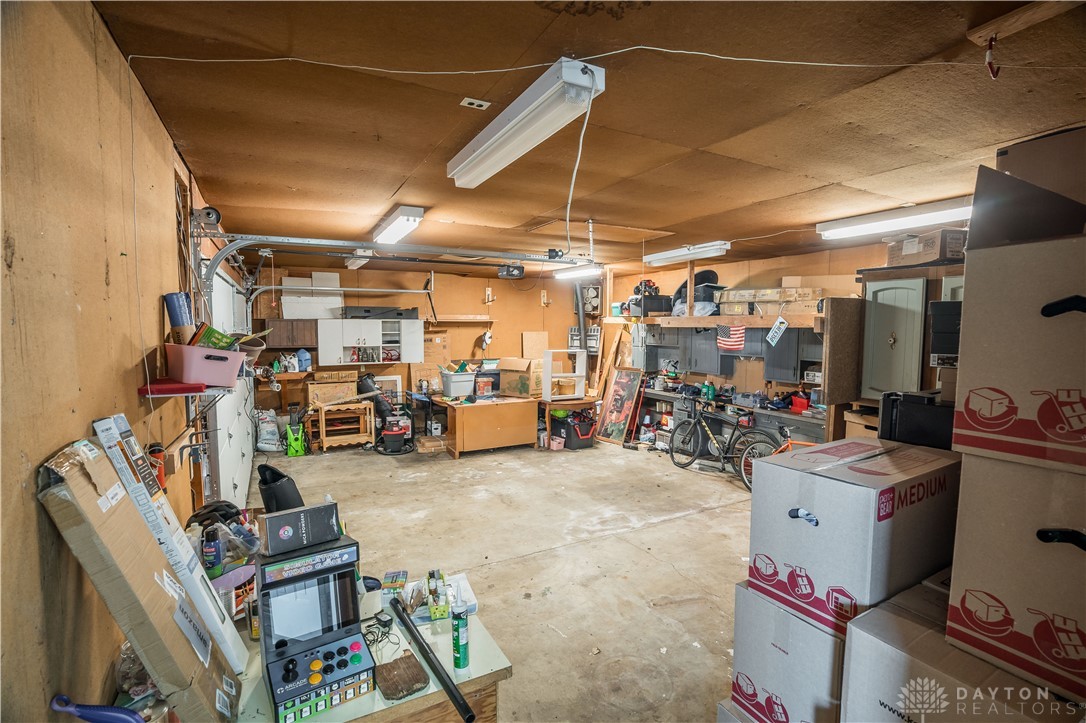 220 Racer Street Troy, OH 45373 - Photo 25 of 33 This spacious garage offers work space and ample room for storage and projects.