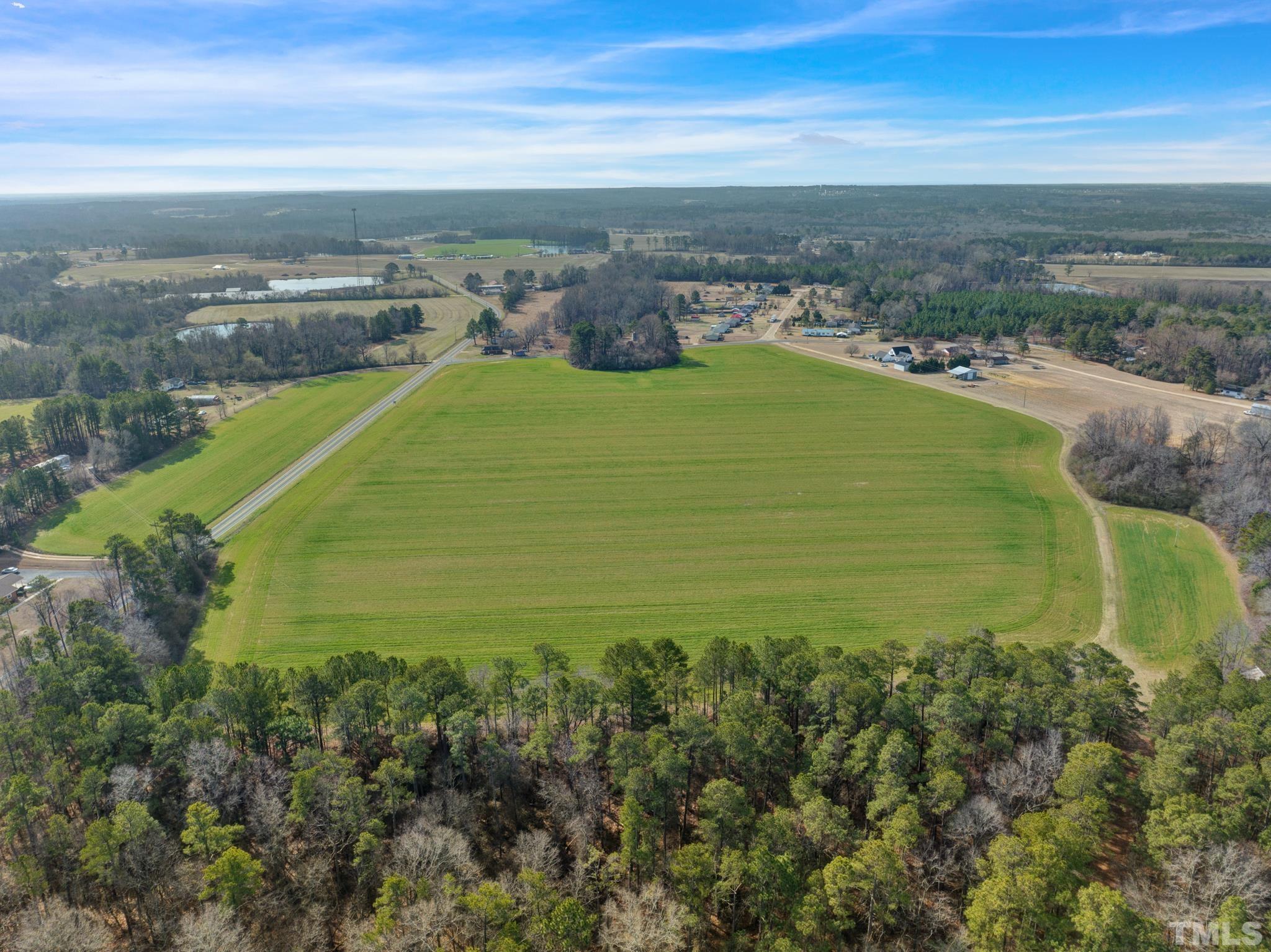 0 Spring Hill Church Road Lillington, NC 27546 - Photo 10 of 22 a view of a lake with a city