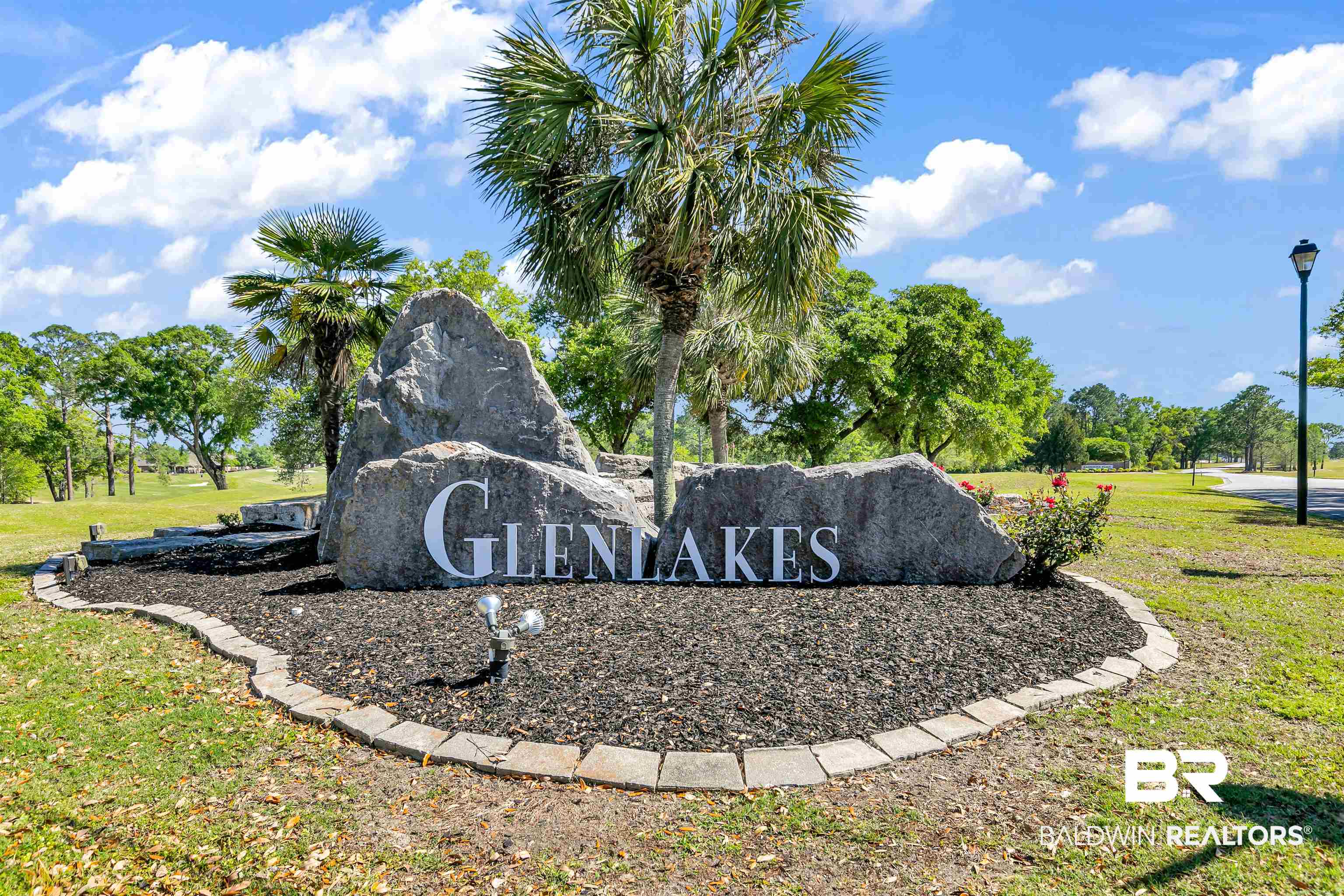 10140 Chipper Lane Foley, AL 36535 - Photo 63 of 72 Community / neighborhood sign featuring a lawn