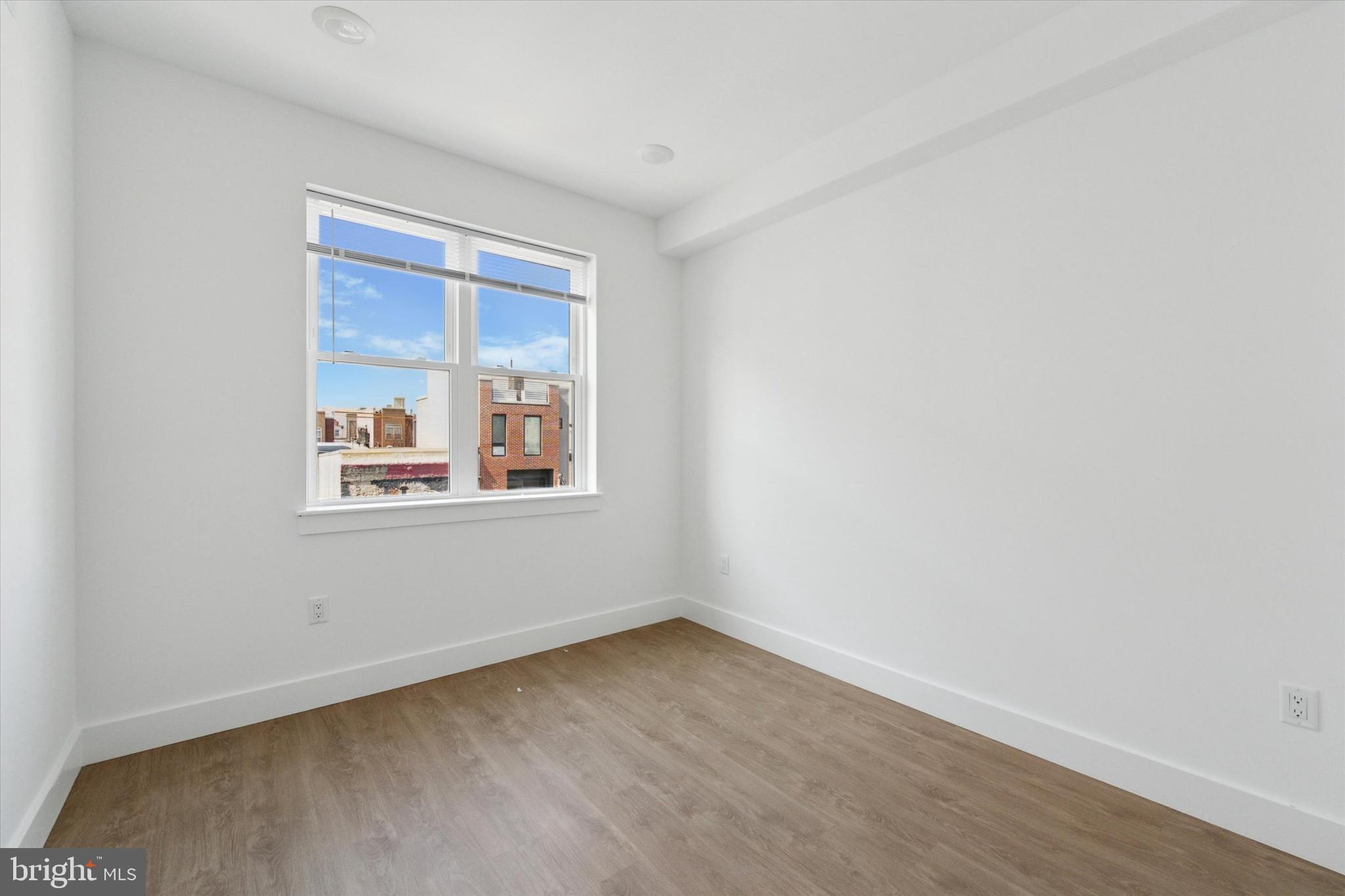 2520 North Front Street, Unit 403 Philadelphia, PA 19133 - Photo 2 of 8 an empty room with a window