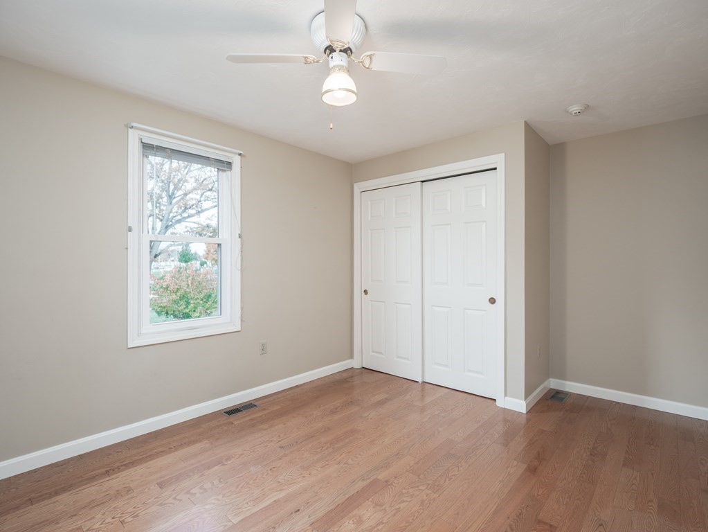 83 Cherry Street Taunton, MA 02780 - Photo 11 of 42 a view of an empty room with a window
