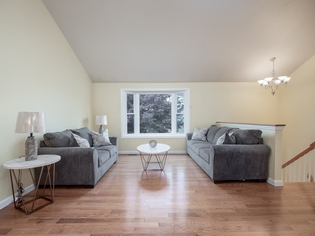 83 Cherry Street Taunton, MA 02780 - Photo 15 of 42 a living room with furniture and a large window