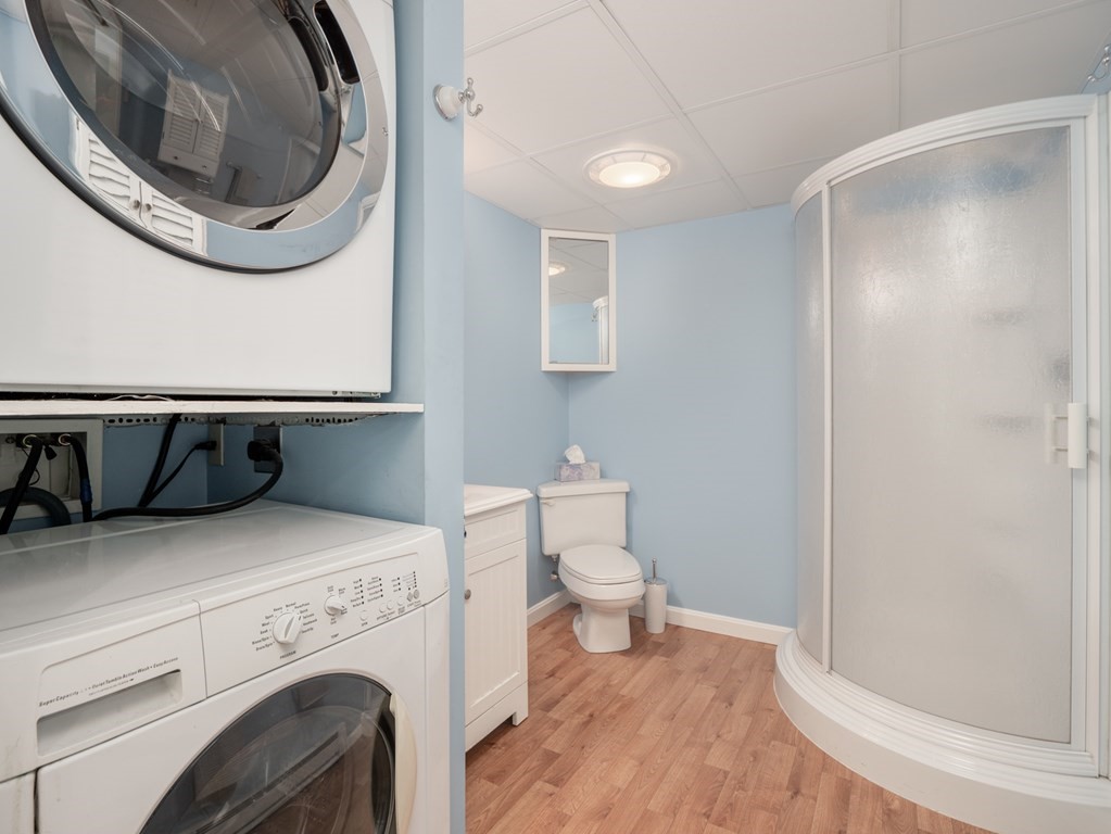 83 Cherry Street Taunton, MA 02780 - Photo 29 of 42 a utility room with dryer and washer