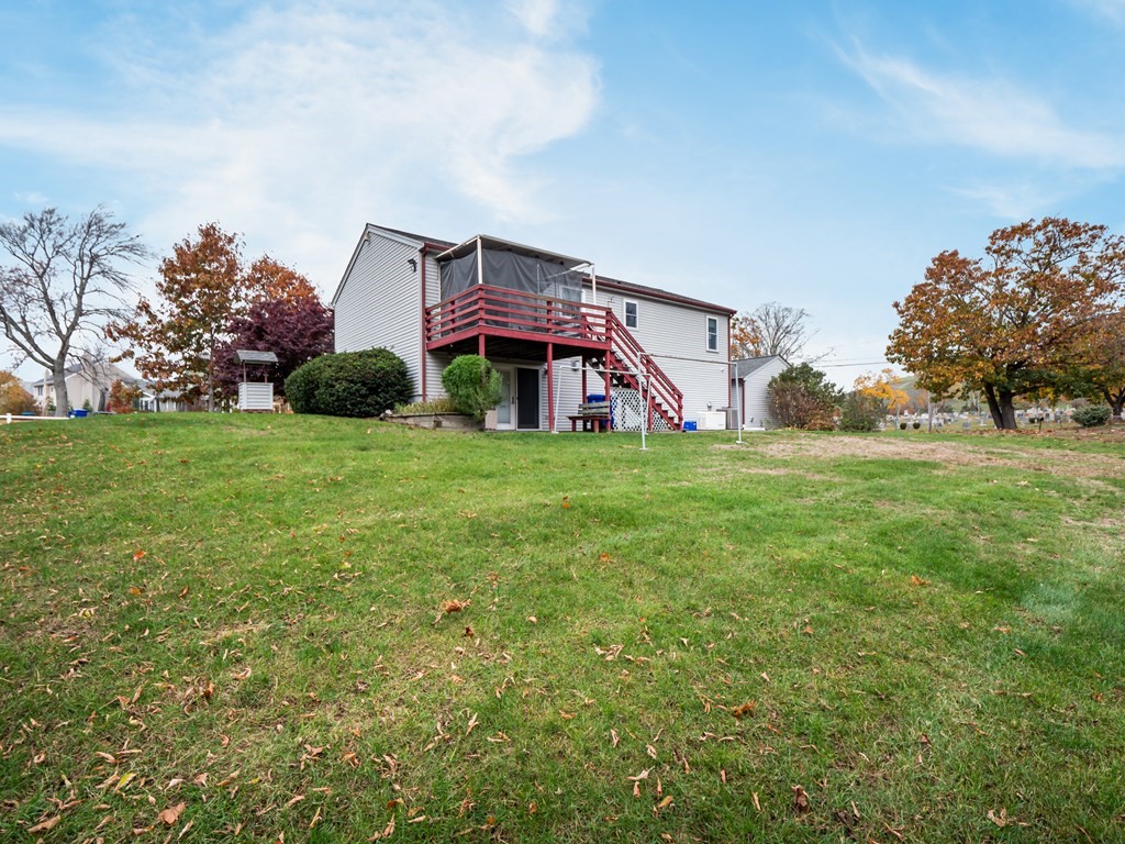 83 Cherry Street Taunton, MA 02780 - Photo 42 of 42 front view of a house with a big yard