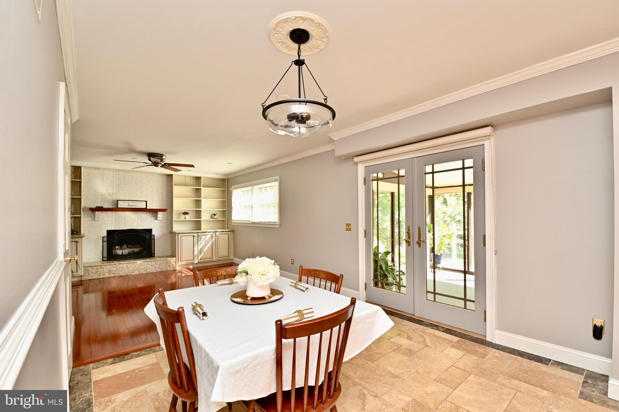 4319 Old Mill Road Alexandria, VA 22309 - Photo 12 of 86 a view of a dining room with furniture window and wooden floor