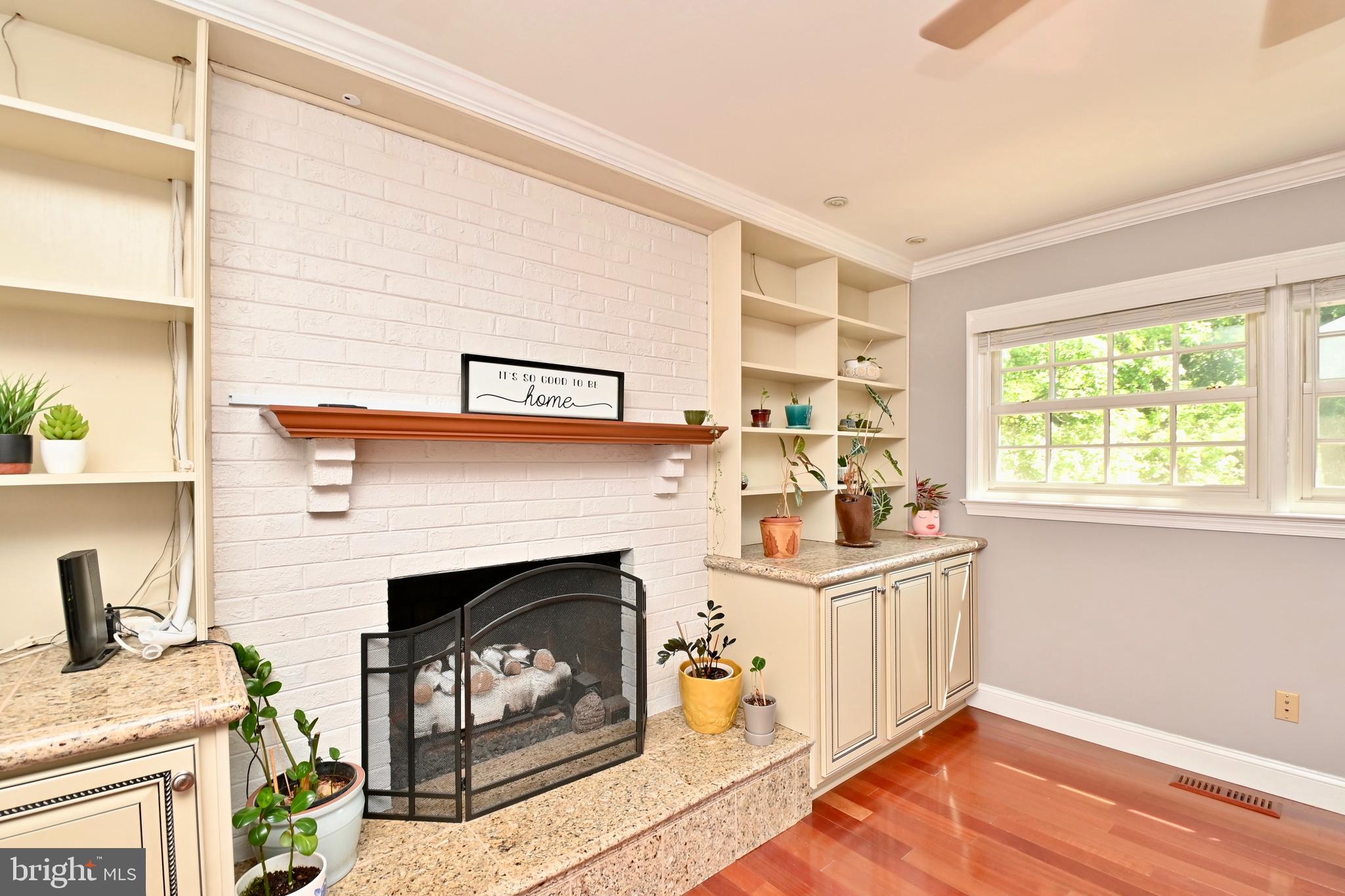 4319 Old Mill Road Alexandria, VA 22309 - Photo 22 of 86 a living room with furniture and a fireplace