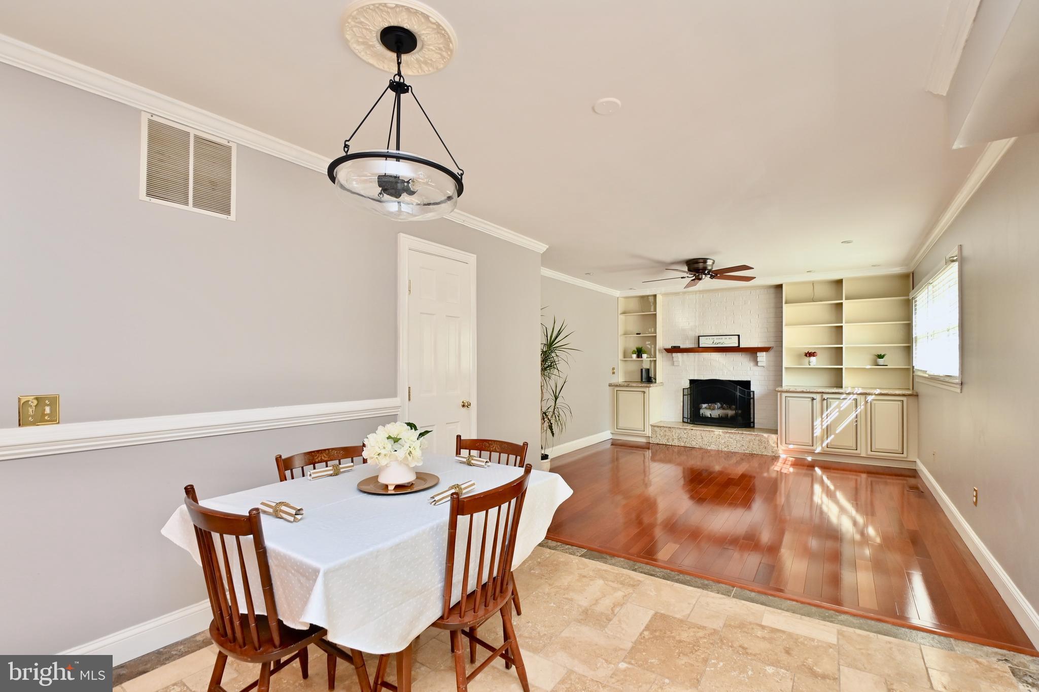 4319 Old Mill Road Alexandria, VA 22309 - Photo 4 of 86 a view of a dining room with furniture and wooden floor