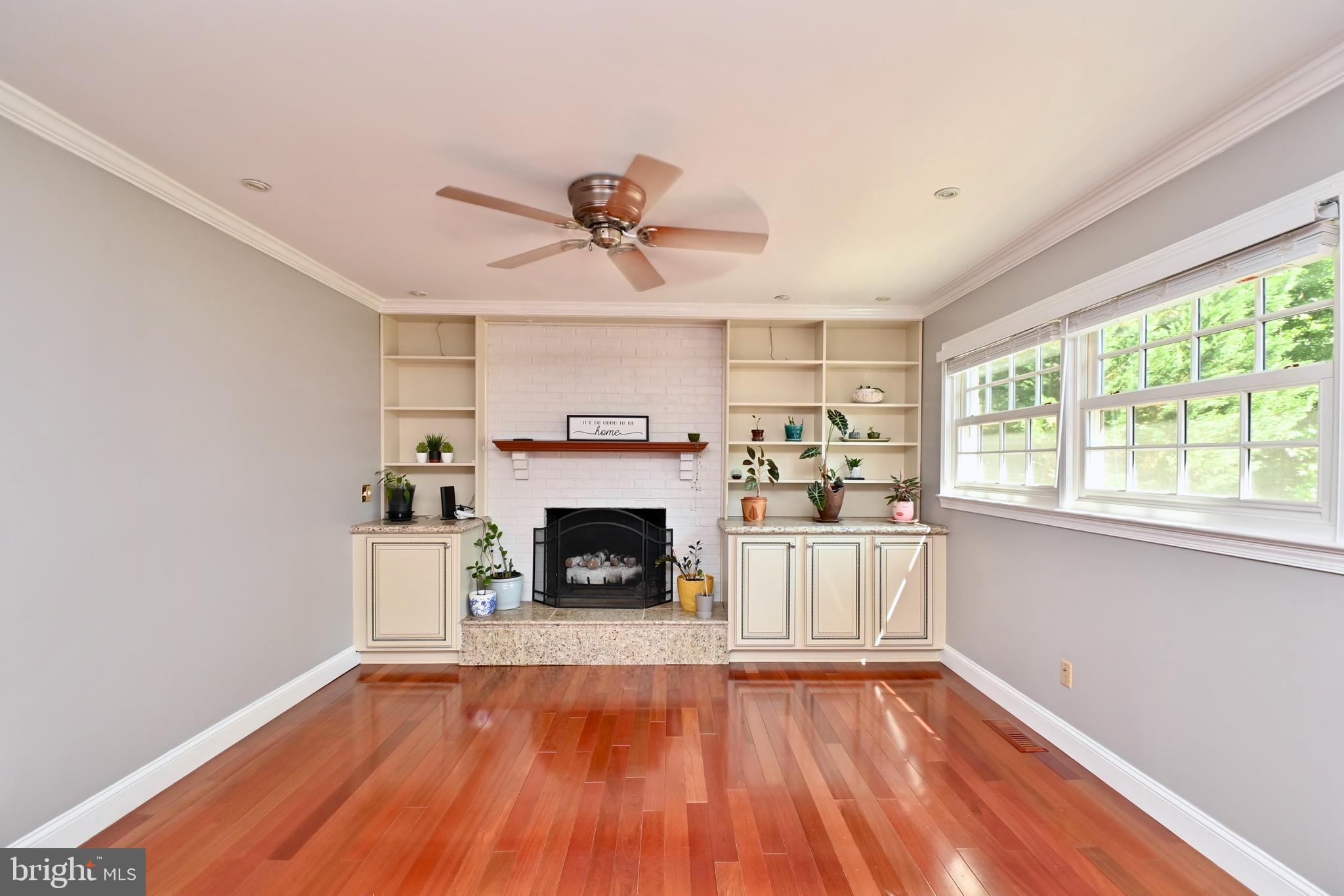4319 Old Mill Road Alexandria, VA 22309 - Photo 43 of 86 a living room with a fireplace with wooden floor