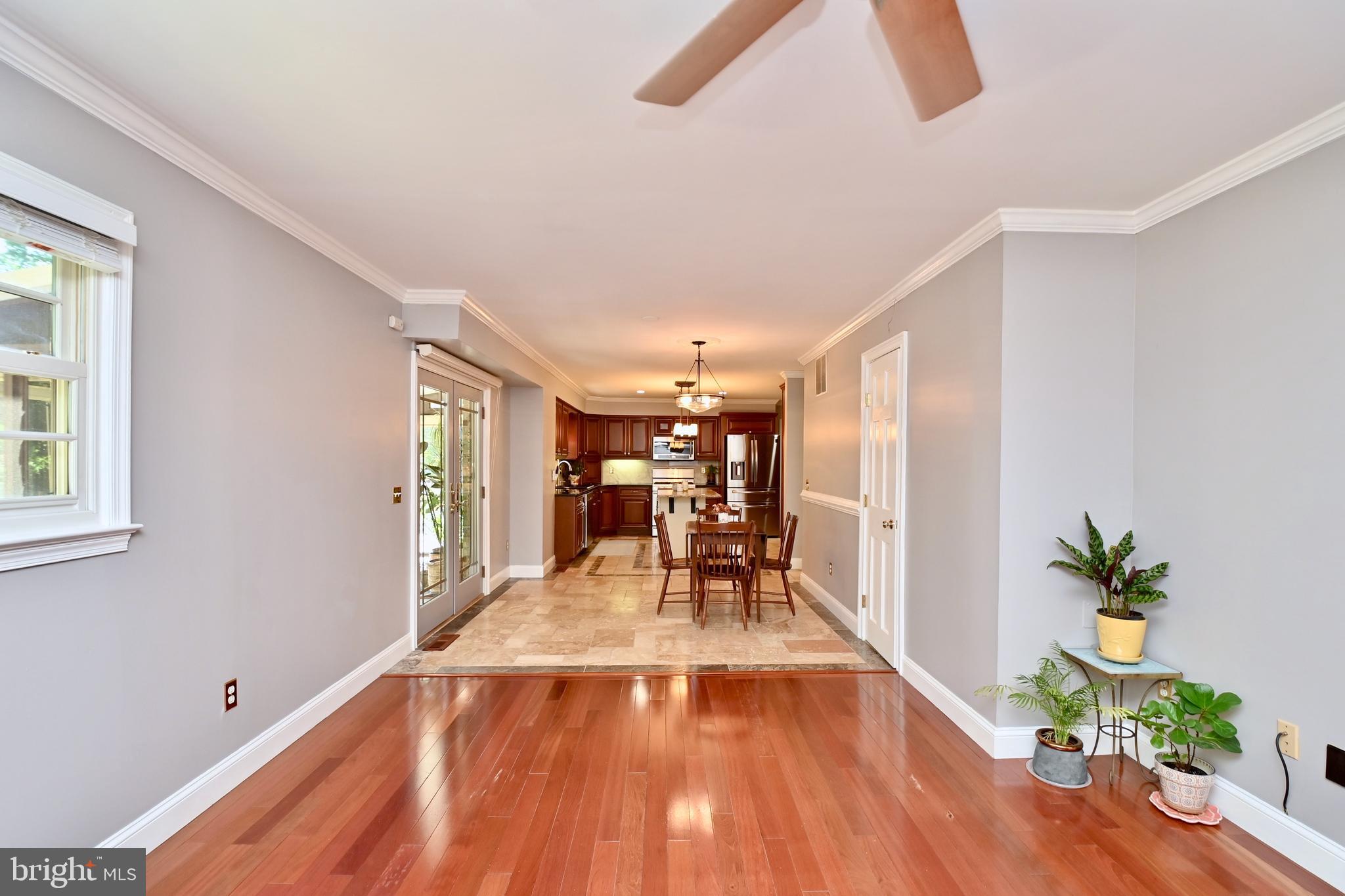 4319 Old Mill Road Alexandria, VA 22309 - Photo 44 of 86 a view of a dining room with furniture window and wooden floor
