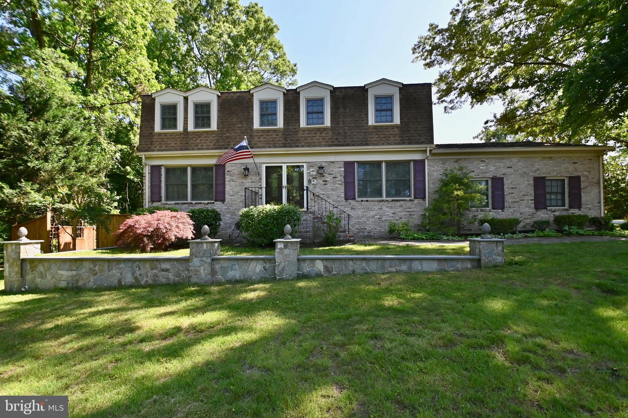 4319 Old Mill Road Alexandria, VA 22309 - Photo 82 of 86 a front view of house with yard and outdoor seating