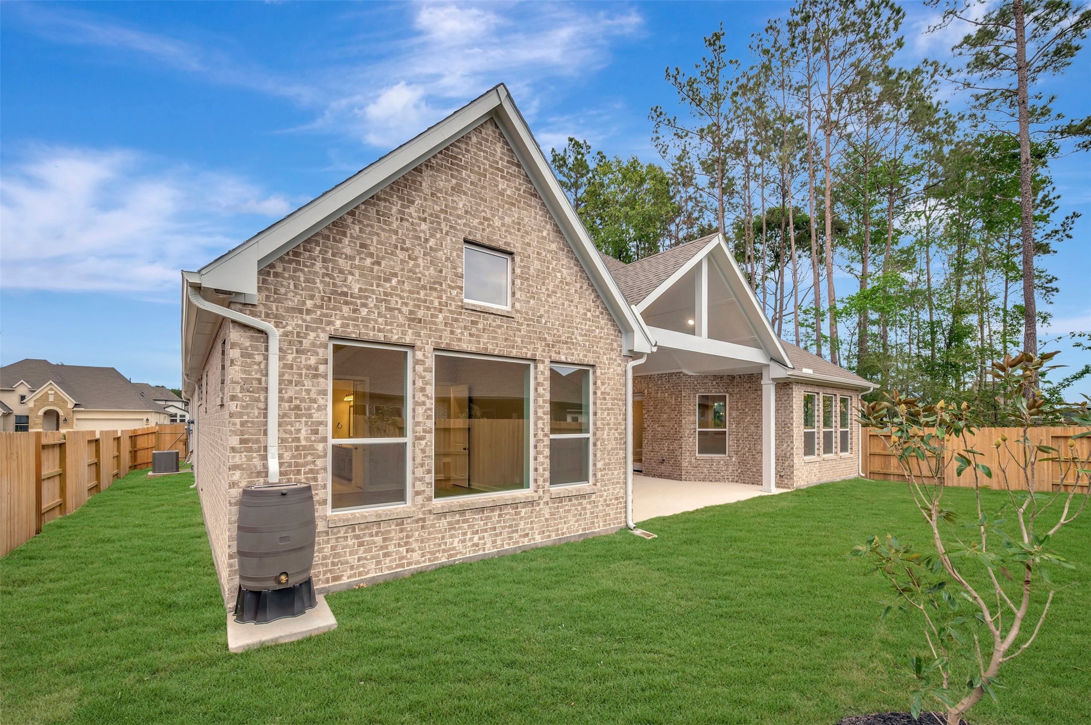 15722 Terracotta Terrace Conroe, TX 77302 - Photo 9 of 50 front view of a house with a yard
