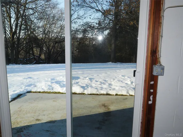 a view of storage and utility room